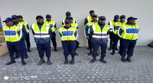Omeya security team standing together in uniform
